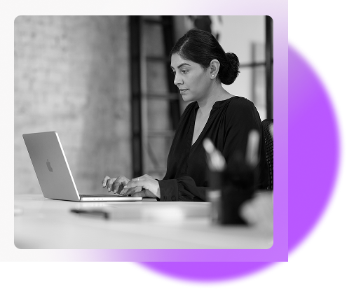 Woman working on a MacBook